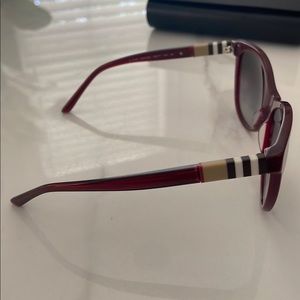 Burberry sunglasses for women, maroon color, comes with case.